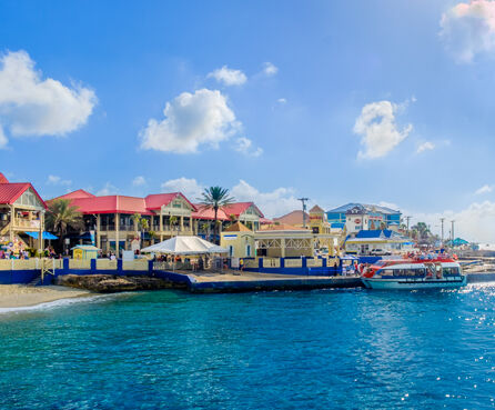 Grand Cayman, Cayman Islands. Tourists embarking on a marine shuttle at George Town port South terminal