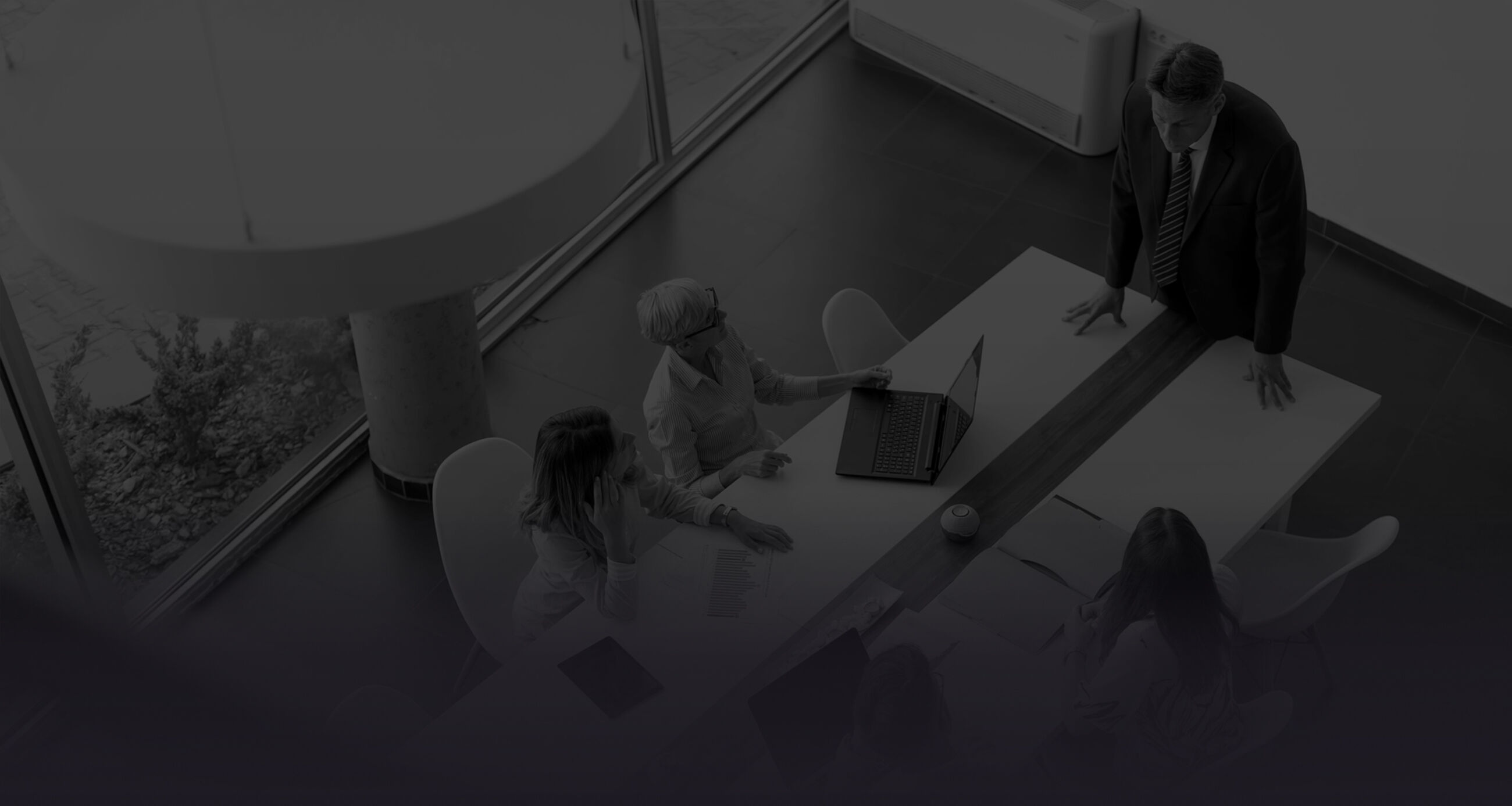 Aerial view of group business people working together in meeting office