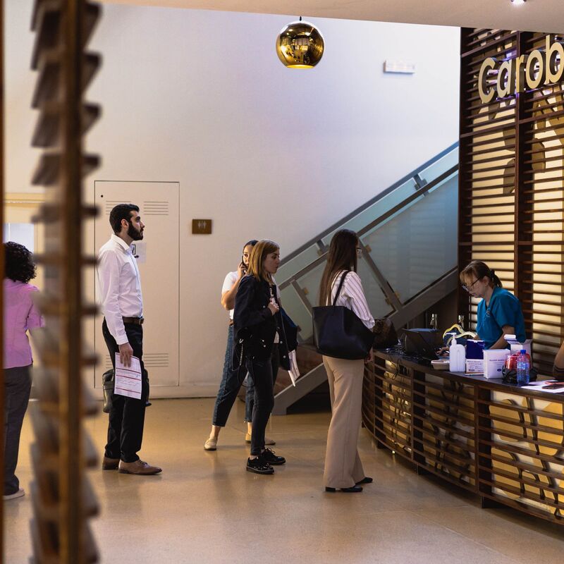 People waiting on line for blood donation registration