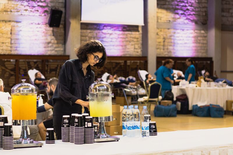 Woman enjoying refreshments at blood donation